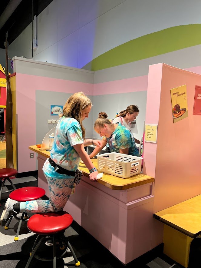 students "working" at museum of play