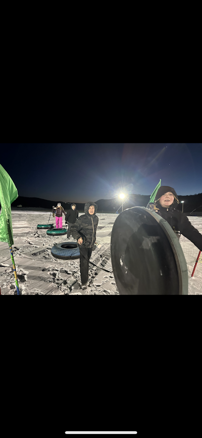 students preparing to snow tube
